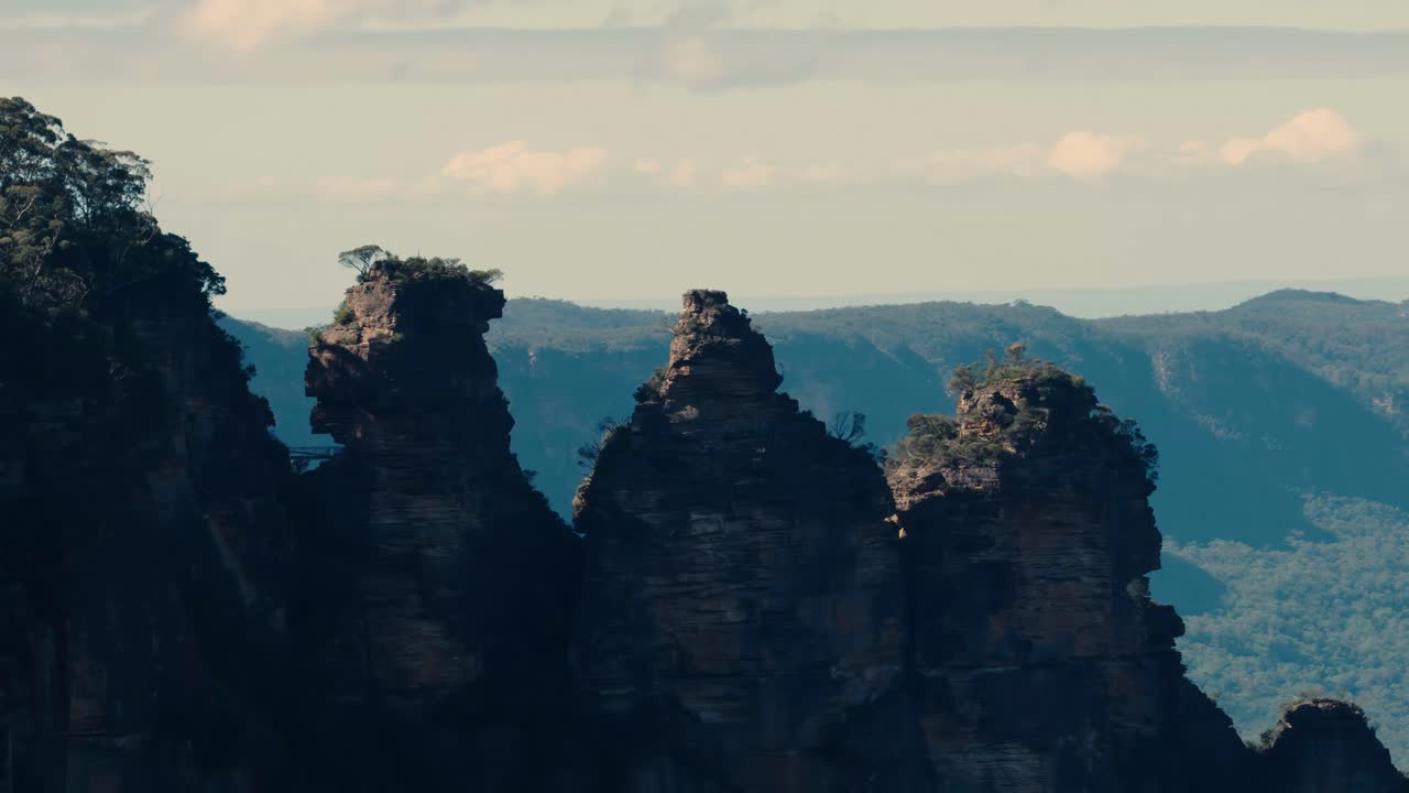 The Three Sisters Famous Rock Formation In The Blue Mountains of New South Wales, Australia. Aerial Close-up Shot