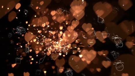 Animation-of-falling-gifts-and-tokens-with-glitter-and-gold-hearts-and-sparks-on-black-background