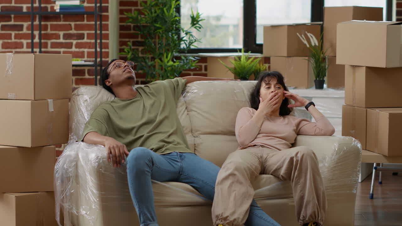 Life partners taking break from decorating new house