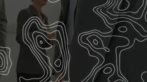 animation of white map lines over businessman handshake