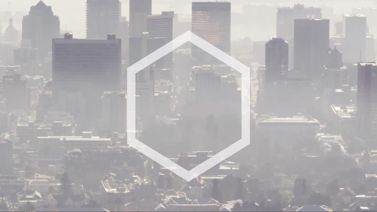 Hexagon animation overlaying urban skyline with tall buildings in view