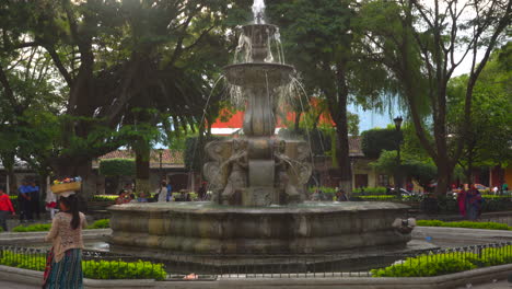 antigua guatemala central park colonial fountain. antigua guatemala.  wide shot .