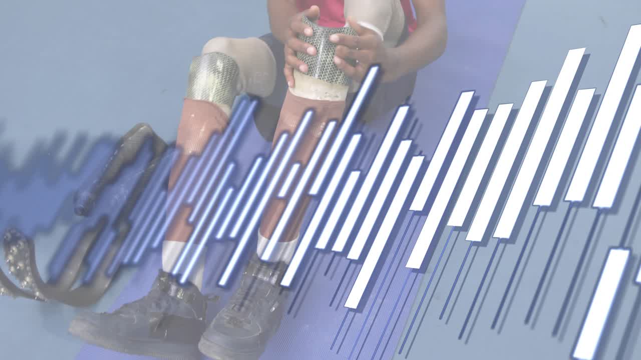 Positioning prosthetic limbs on mat, teenager inspecting and inserting limbs for rehabilitation