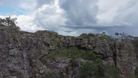 Aerial-orbits-rugged-stone-arch,-el-arco-grande-in-remote-Bolivia