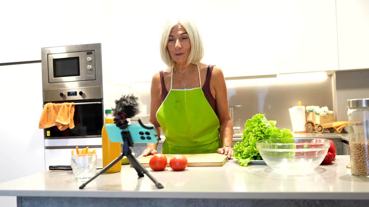Woman Vlogging Cooking in Kitchen