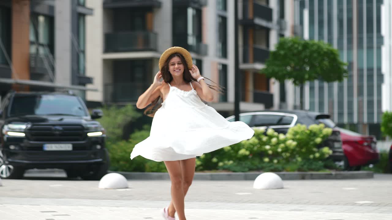Woman in a White Dress and Straw Hat in a City | Premium Stock Video ...