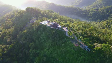 aerial view of beautiful restaurant "enam langit plataran" on the top of hill in the morning.