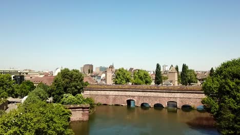 Aerial-view-of-the-ponts-couverts,-the-covered-bridge,-in-Petit-France,-Strassbourg,-France,-Europe