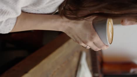 woman enjoying a latte