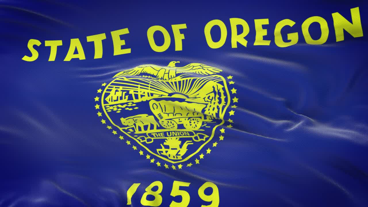 bandera de oregon (estado de los estados unidos) ondeando en el viento con una textura de tela muy detallada. bucle sin costuras