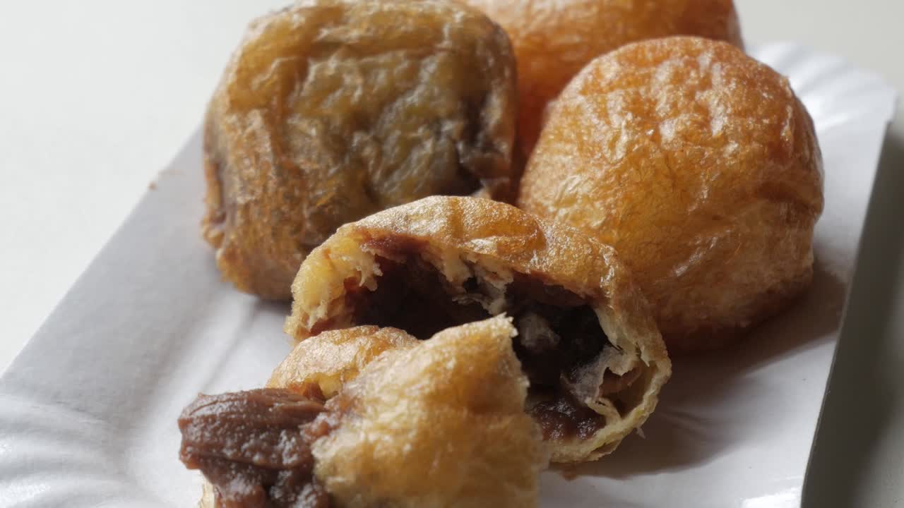 Crispy Fried Dough Balls with Chocolate Filling