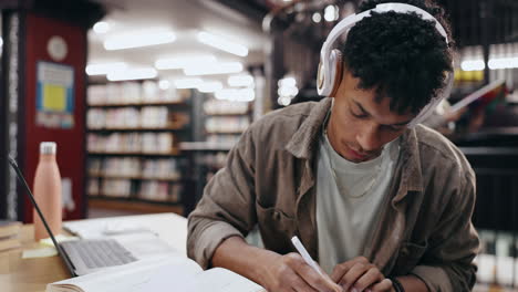 student studying in library