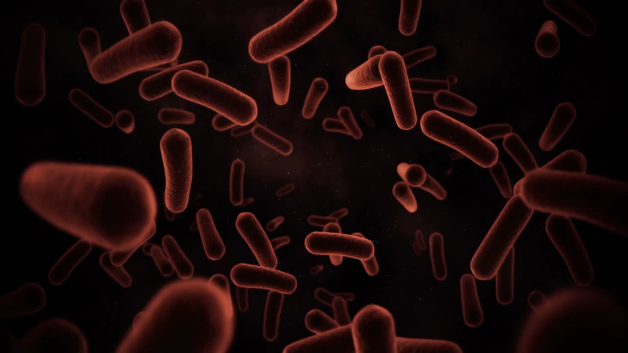 Cellule batteriche generate digitalmente che scorrono su sfondo nero