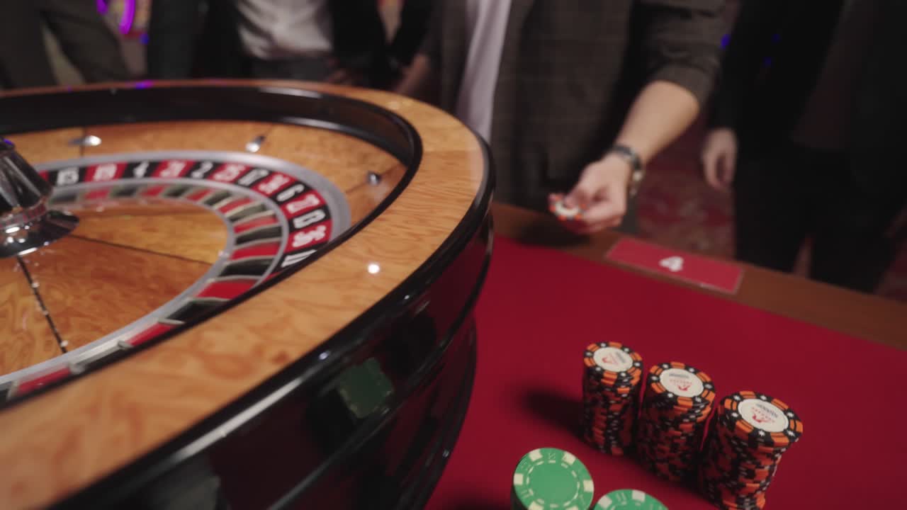 A detail shot of roulette machine together with the poke coins.