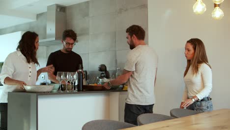 Hospitable-young-couple-preparing-dinner