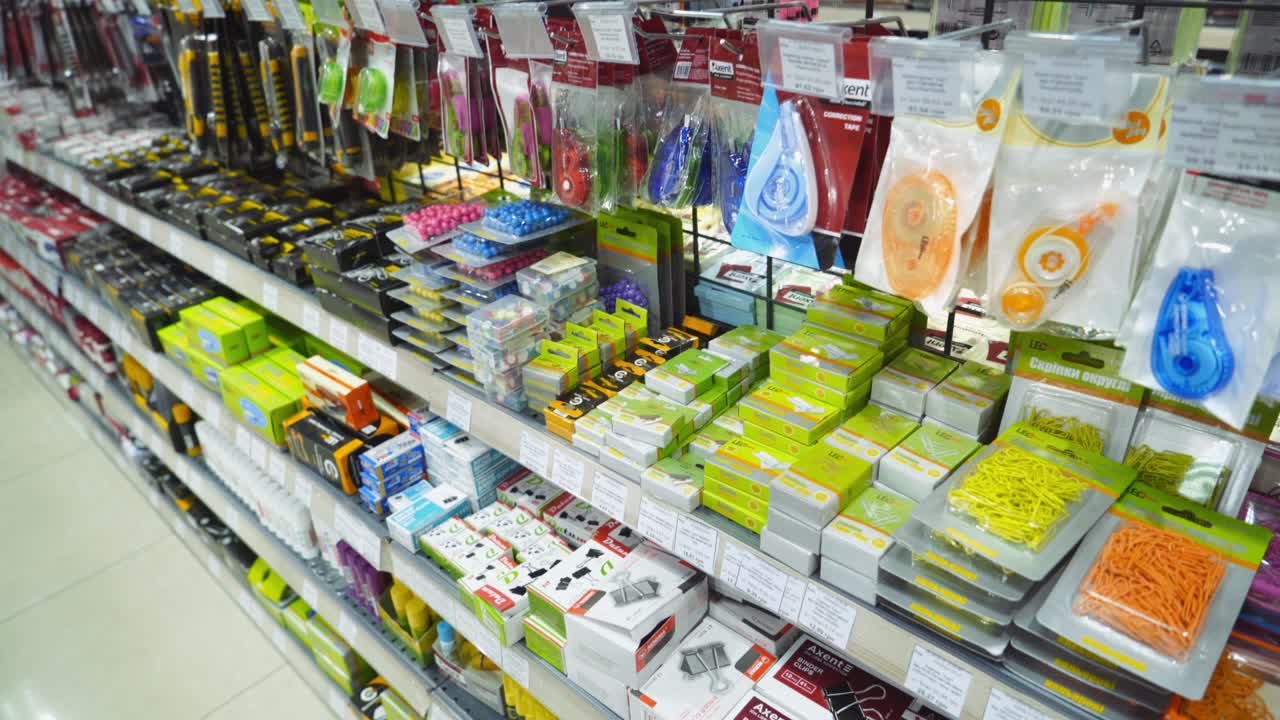Vinnitsa, Ukraine - August 20, 2018: Back to school concept. Purchase of stationery in the store. Close-up.