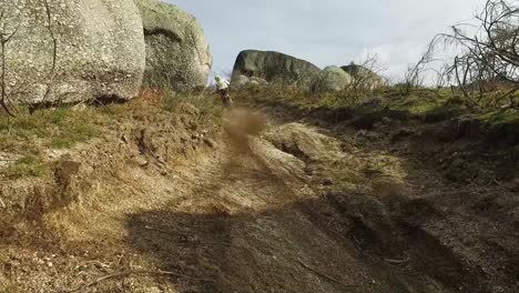 Extreme-Motocross-Riders-riding-on-dirt-track-on-a-sunny-late-summer-day-on-public-training-session-in-preparation-for-Motocross-event