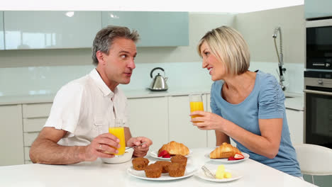 mature couple having a romantic breakfast together