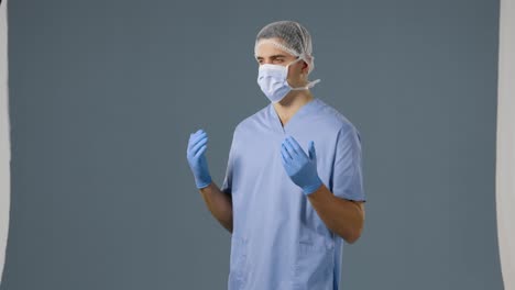 young surgeon in scrubs