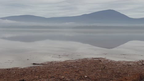 foggy, beautiful, mysterious early spring day on a pristine mountain lake