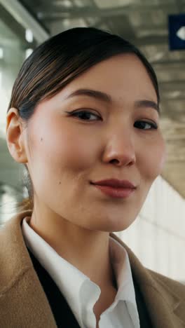 businesswoman at a station