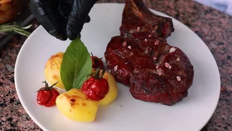 chef preparing a gourmet steak dish