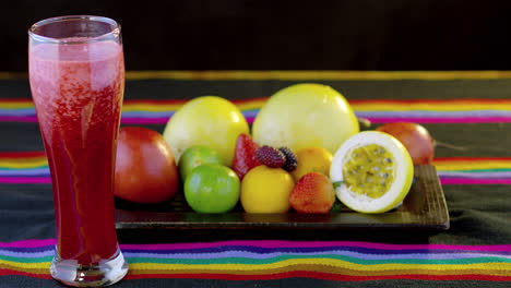 fresh fruits and a glass of strawberry juice