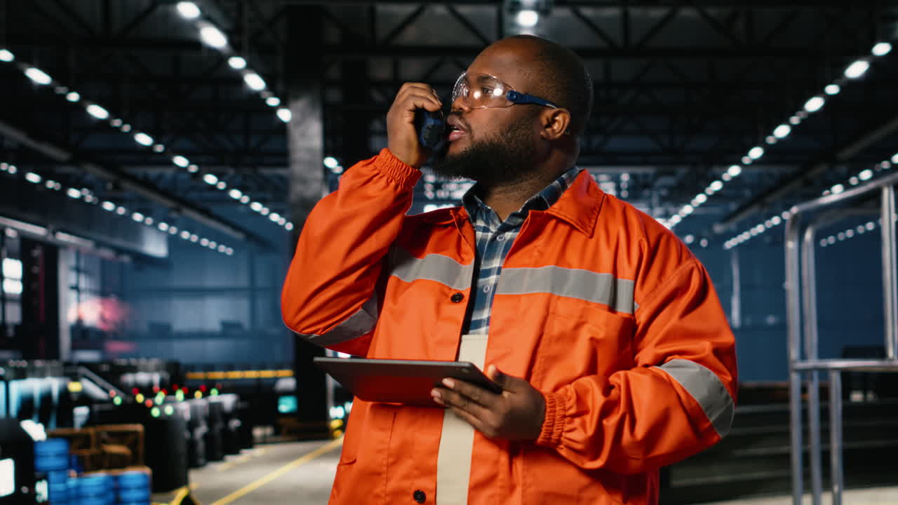 Black inspector uses radio communication to coordinate labor activity