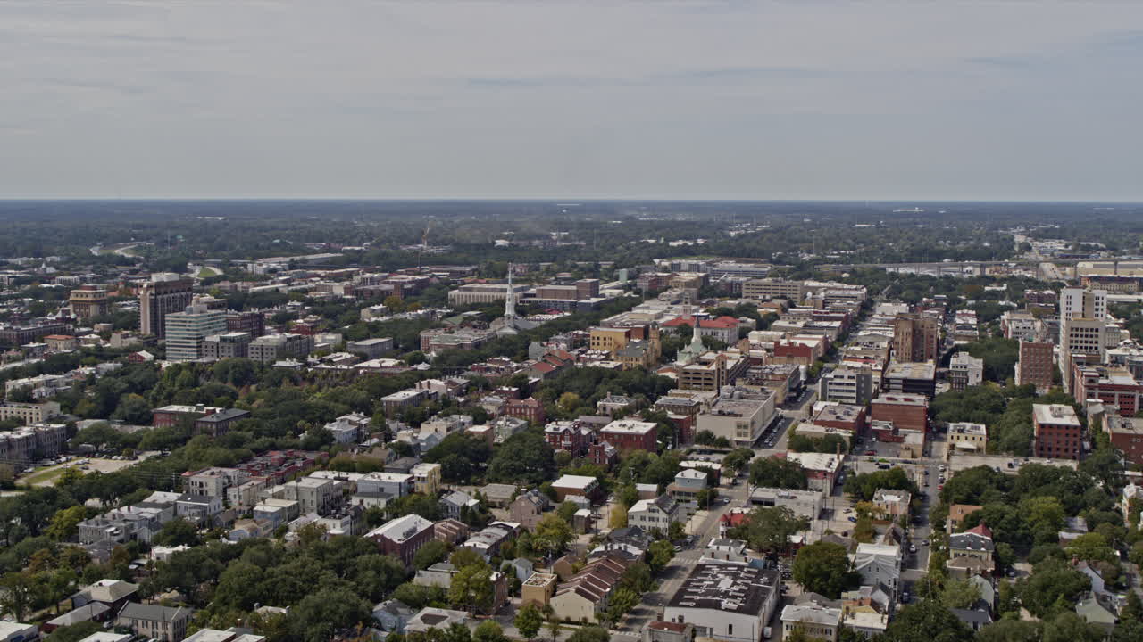 Savannah Georgia Aerial v47 panoramic orbiting shot capturing cityscape across historic district south, downtown river and hutchinson island - Shot with Inspire 2, X7 camera - October 2020