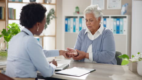 doctor consulting with elderly patient