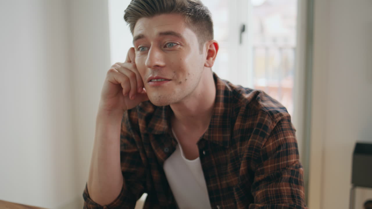 Closeup couple hands table during home conversation. Loving man talking partner