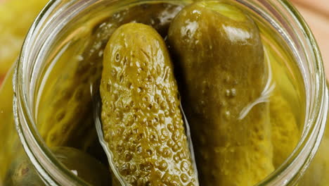 opening a jar of pickles with a date stamp