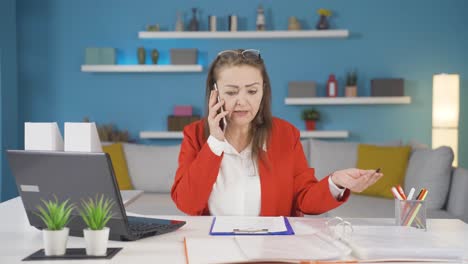 home office worker woman phone angry performs business call.