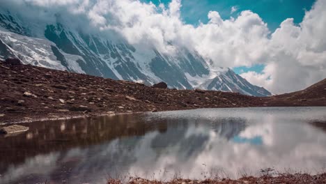 reflections of the mountain in a lake