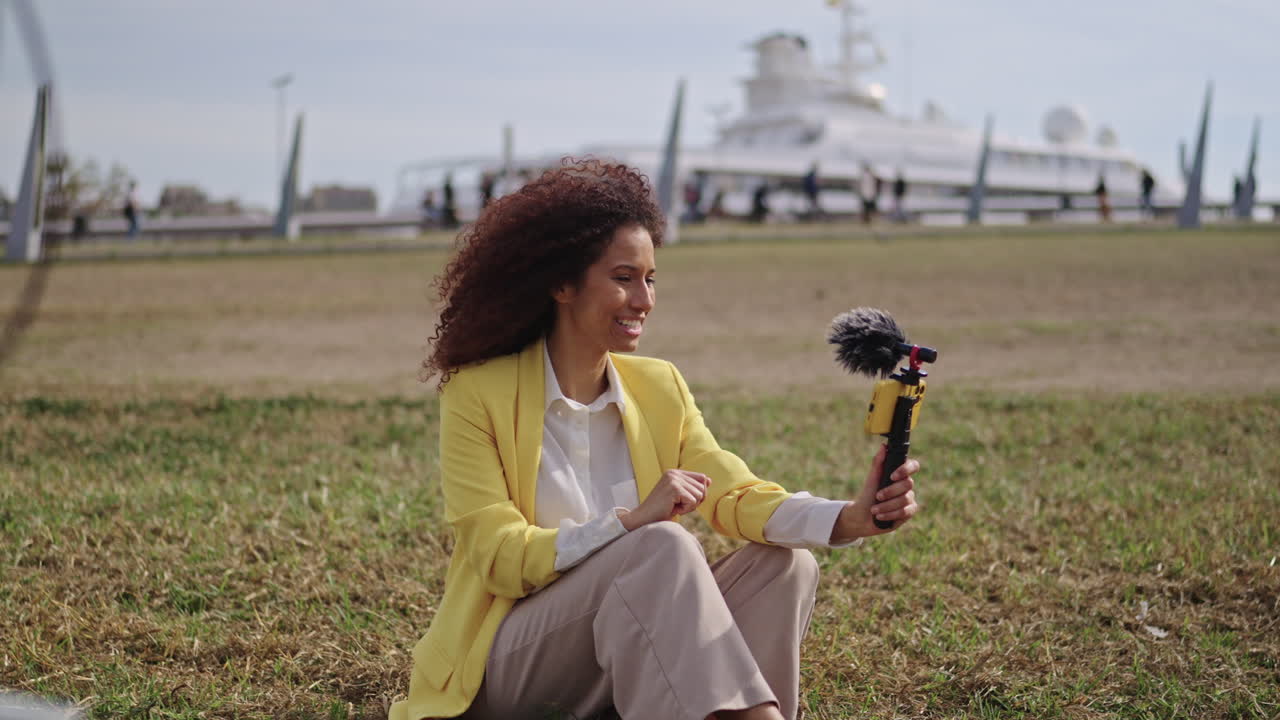 Woman Vlogging Outdoors with Bicycle