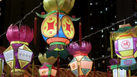 chinese light lanterns, which symbolize prosperity and good fortune, hang from ceiling wires during the mid-autumn festival, also called mooncake festival