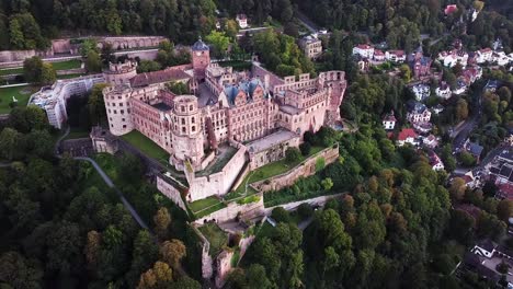 aerial drone view of heidelberg castle, medieval fortress on the hill above the city - landscape panorama of germany from above, europe