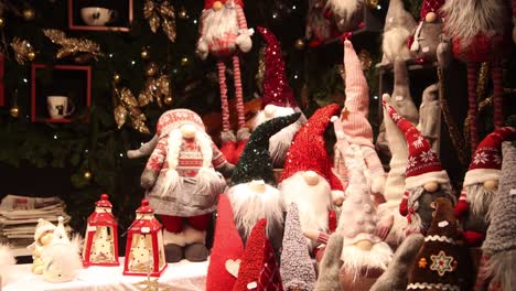 christmas shopping for cute elf decorations at festive christmas market in strasbourg, france europe