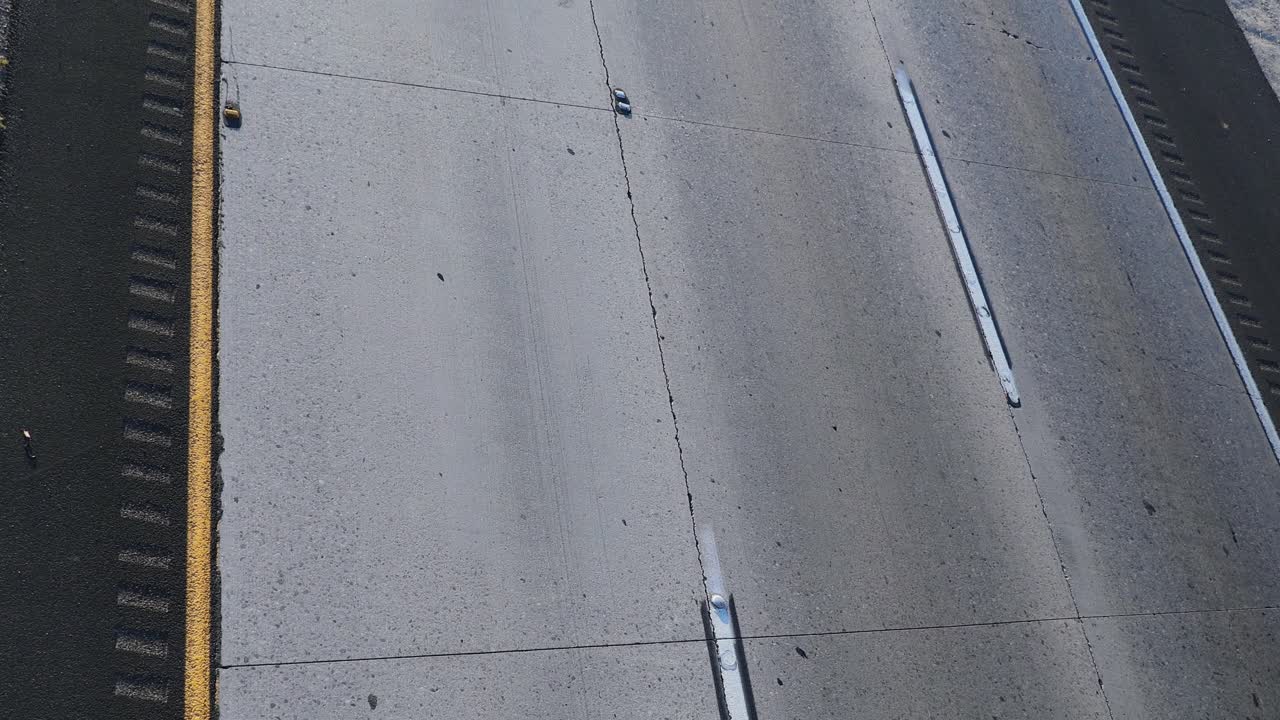 Top view of cars driving on highway. Traffic on interstate road
