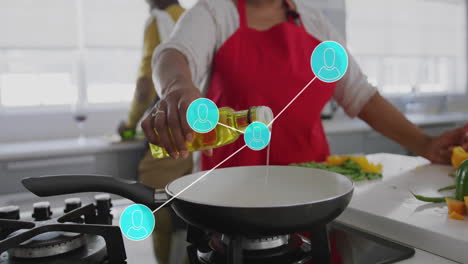 animation of network of connections with icons over senior african american couple cooking