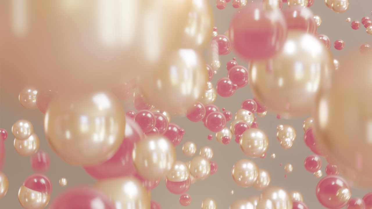 Collagen bubbles motion animation. Golden and Pink liquid bubbles floating in air.
