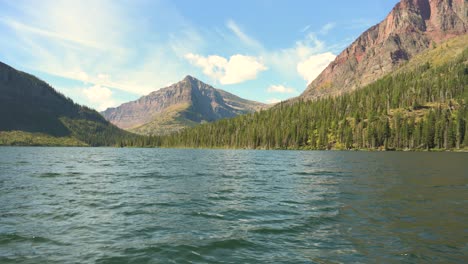 sinopah mountain viewed by boat during the day in glacier national park