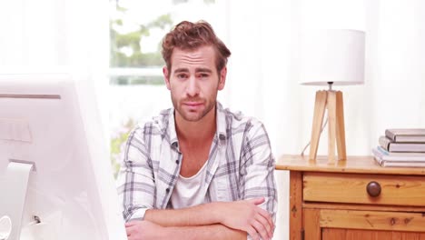 A-concentrated-man-thinking-before-his-computer