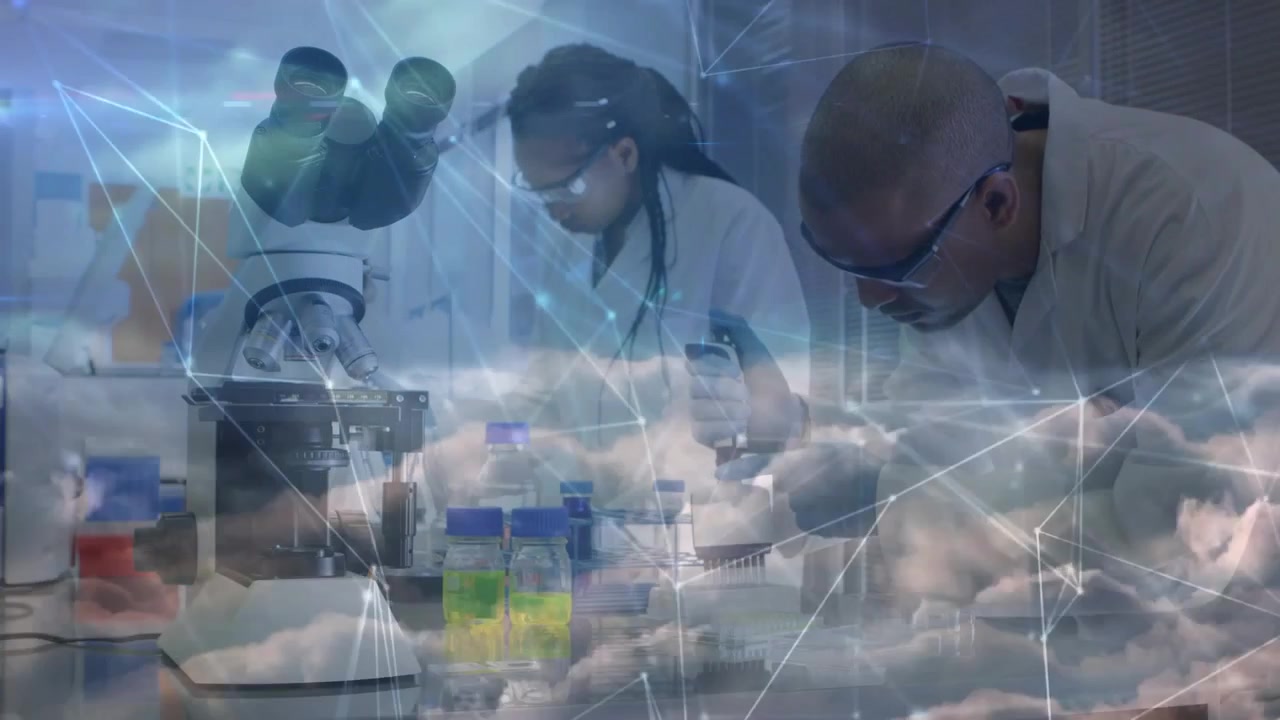 Two scientists starting pipetting for samples at lab bench, sparking cloud network over pipette