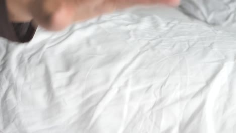 close up of women hand over a blanket