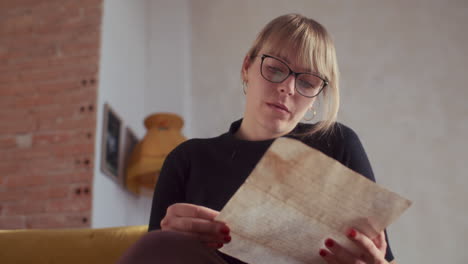 woman reading an old letter