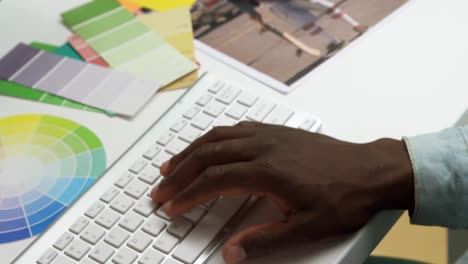 young man working in a creative office