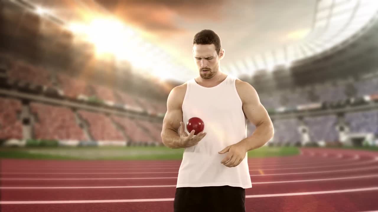 atleta masculino preparándose para lanzar una pelota de tiro