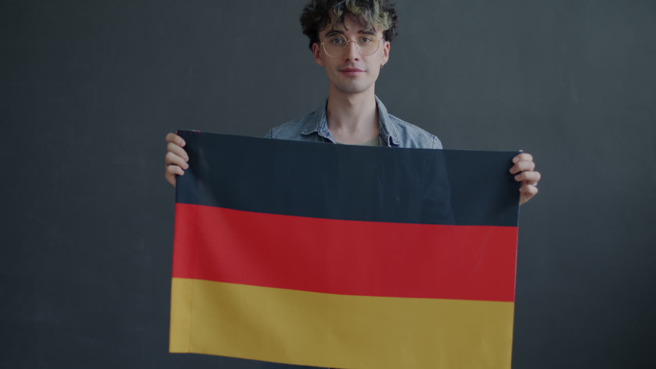 Man Holding the German Flag