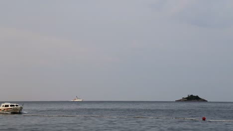 small fishing boat on a gloomy wheather in croatia in slow motion